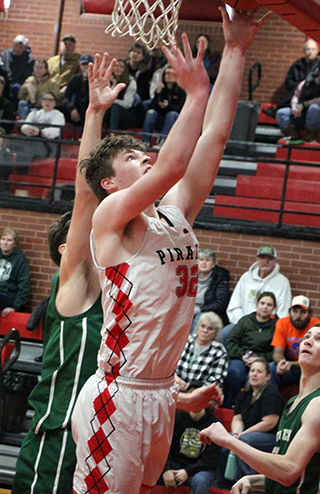 Nate Forsmann scores a lay-up against Potlatch.