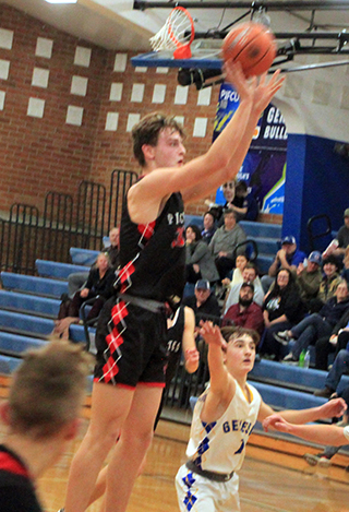 Lee Forsmann puts up a jumper at Genesee