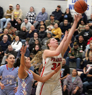 Kylie Schumacher scores a lay-up against Lapwai.