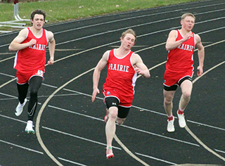 Ben Secrest, Dylan Uhlenkott and Matt Wemhoff in the 200 meter dash. Uhlenkott won this event as well as the 100 and 400.