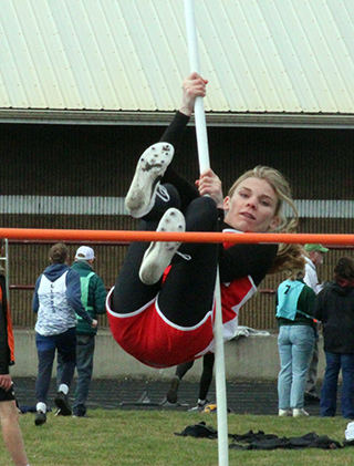 Blake Uhlenkott tied for first in the pole vault with teammate Sierra Oliver.