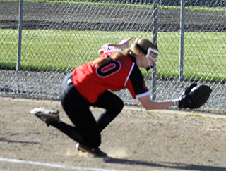 Ivy Walker goes to the ground to make a catch on a foul pop up in the CV game.