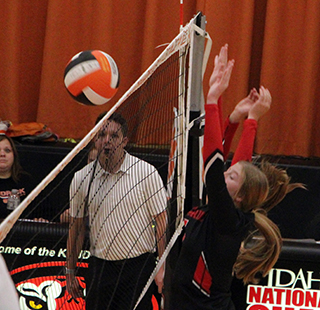 Hailey Hanson makes a block at Kendrick.