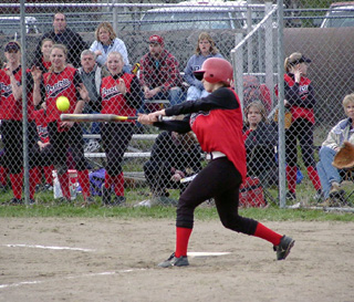 Heather Schierman connects for a hit against Kamiah.