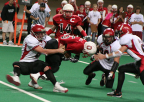 Branden Waller tackles an Oakley runner for a loss as Kyler Shumway and Andrew Gabica move in.