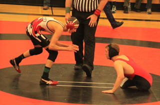 Having a handicap doesn't necessarily keep you from competing as Tyler Ross of Prairie faced Kyle Ritz of Lind-Ritzville at the Pomeroy Tournament.