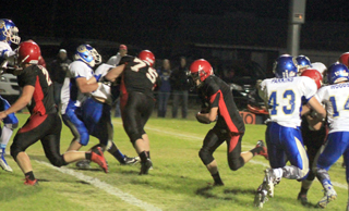 The line blocked open a huge hole for Luke Wemhoff on this 2-point play after Prairies only second half touchdown. Calvin Hinkelman and Philip Spencer are shown making blocks.