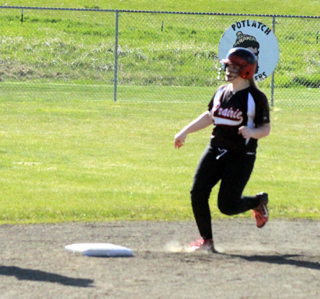 Noelle Uhlenkott pulls into second with a double against Lapwai.