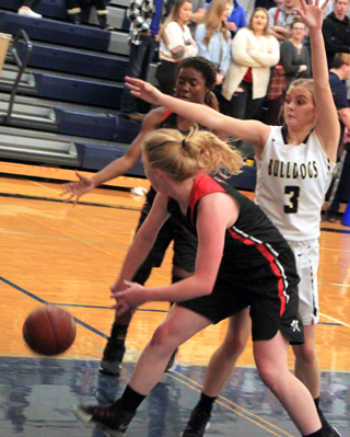 Kristin Wemhoff makes a bounce pass to Madison Shears.