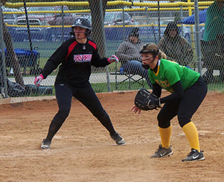 Mackenzie Key leads of third base against Potlatch.