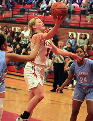 Kristin Wemhoff goes for a lay-up against Lapwai.