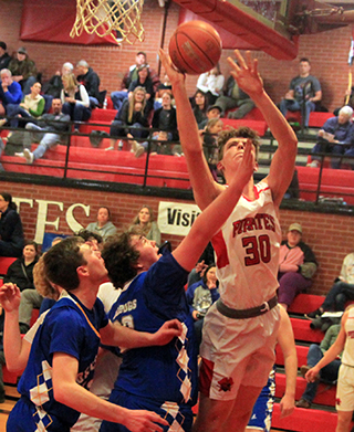 Lee Forsmann goes for 2 of his 21 points against Genesee.