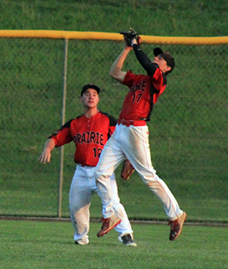 Colton McElroy makes a catch in center against C.V.  Leftfielder Jake Quintal backs up the play.