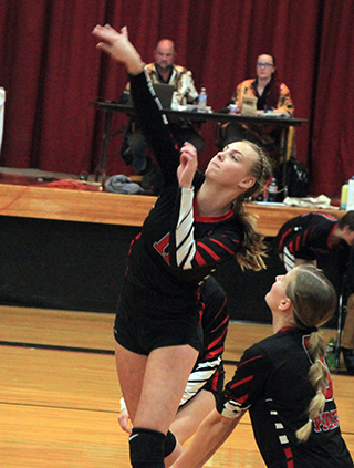 Alli Geis spikes the ball on Senior Night against Lapwai.