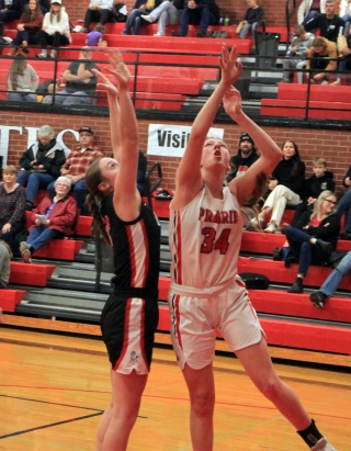 Kylie Schumacher puts up a shot against Deary. She had 24 points and 24 rebounds in the game.