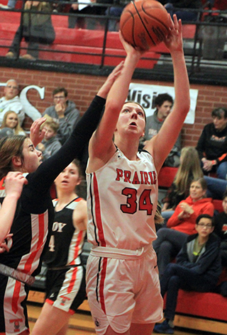 Kylie Schumacher goes for a lay-up against Troy.