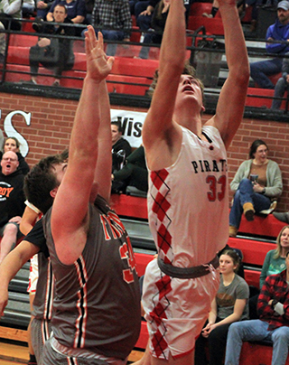 Lee Forsmann goes for a lay-up against Troy.