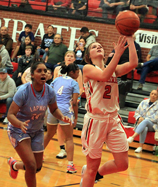 Lexi Schumacher scores a lay-up against Lapwai.