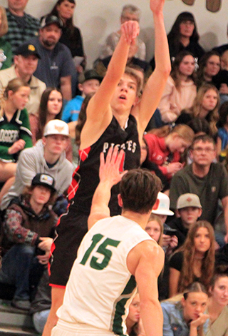 Briggs Rambo puts up a jump shot at Potlatch.