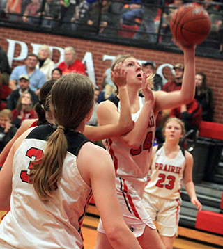 Kylie Schumacher scored 24 against C.V. in the Pirates District opener. Also shown are Sage Elven and Erica Schlader.