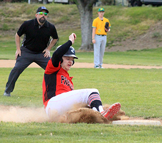 Noah Behler slides into third in the second Potlatch game.