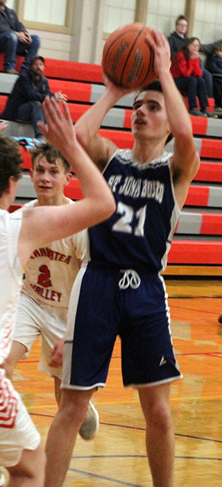 Cody Weckman looks to shoot at C.V.