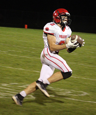 After sitting out the Kamiah game with an injury, Cooper Riener came back in a big way with 4 pass receptions, all for touchdowns, plus a punt return for a touchdown. In the photo above he makes a catch that led to an 85 yard scoring play.