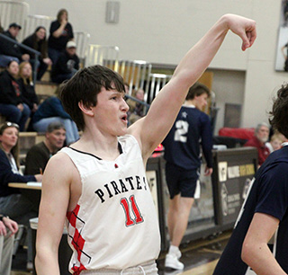 Max Rehder watches his 3-point shot go through the hoop in the 3rd place game against North Star Charter.